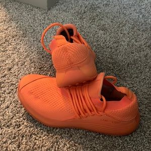orange running sneakers
